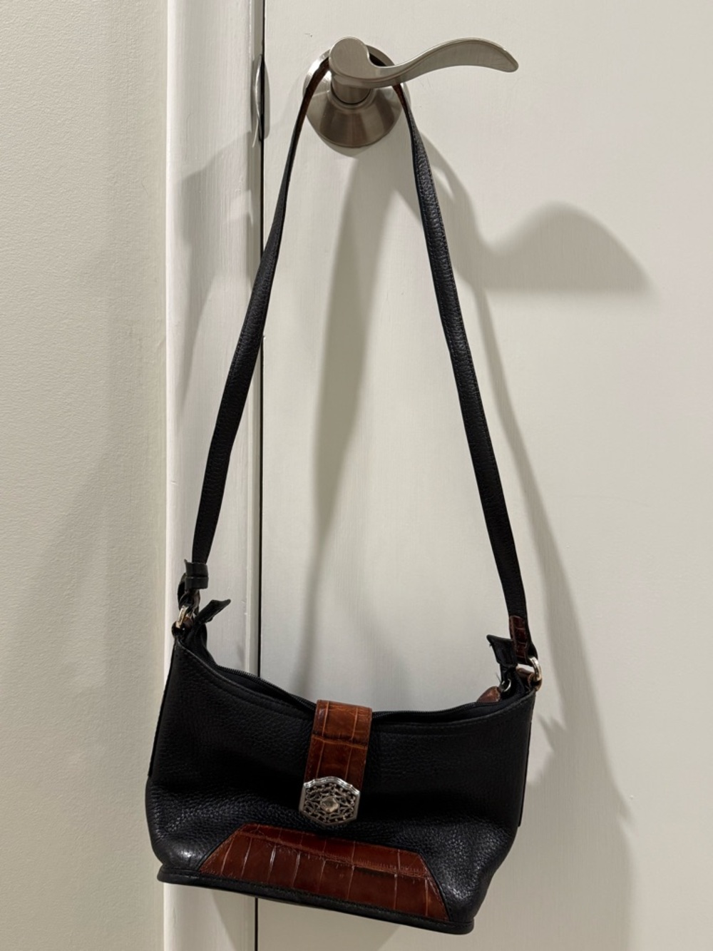 Brighton Black and Brown Leather  Bag with Accent Strap and Hang Tag.
